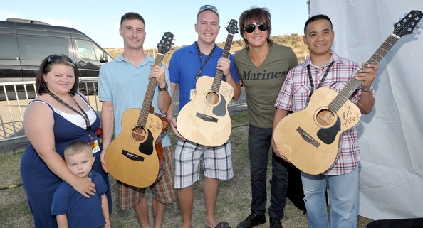 Richie Sambora with Voyage-Air Guitar recipients Brian Mullen, Wendell Tabios, David Vizcaino, Tacy Watson, Marcy Sanchez, Logan Watson