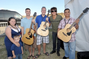 Richie Sambora with Voyage-Air Guitar recipients Brian Mullen, Wendell Tabios, David Vizcaino, Tacy Watson, Marcy Sanchez, Logan Watson