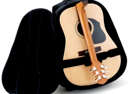 Full-size travel guitar folds in half fits and in the included backpack